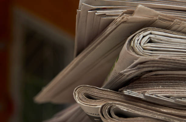 istock Stack of newspaper, close-up. Journalism concept 1322256467