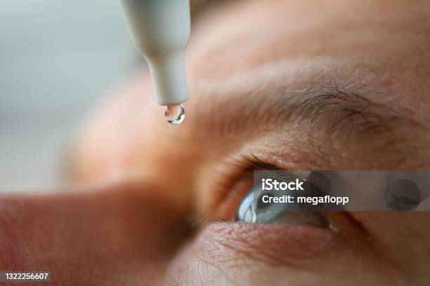 Man Drops Eye Drops Install Lenses Moisturizing Stock Photo - Download Image Now - Eyedropper, Eye, Glaucoma
