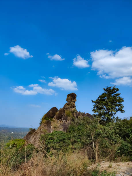 istock Amazing nature view with rocks and greens under the sky 1322257494