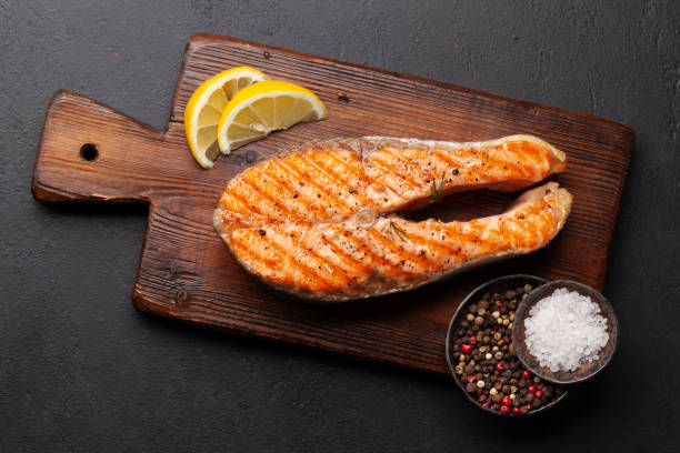 istock Grilled salmon steak. Fish steak with herbs and spices 1322262094