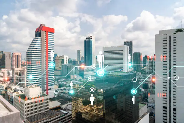 Photo of Social media icons hologram over panorama city view of Bangkok, Asia. The concept of people networking and connections. Double exposure.