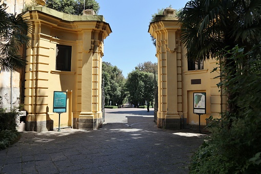 Naples, Campania, Italy - June 3, 2021: Entrance of Porta di Mezzo of the Real Bosco di Capodimonte from Via Miano