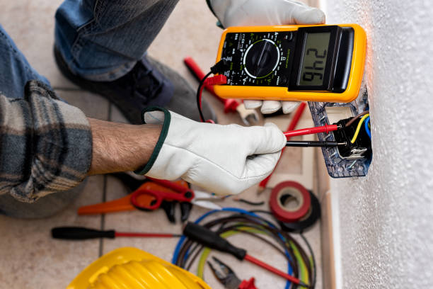 electrician at work on a residential electrical system. electricity. - electrical contractor imagens e fotografias de stock