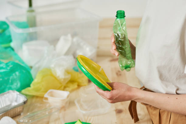 istock Woman throwing the rubbish 1322270178