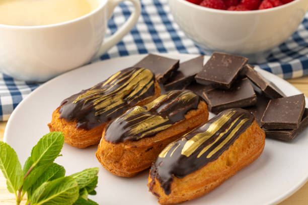 istock Eclair cake close up on wooden table 1322270359
