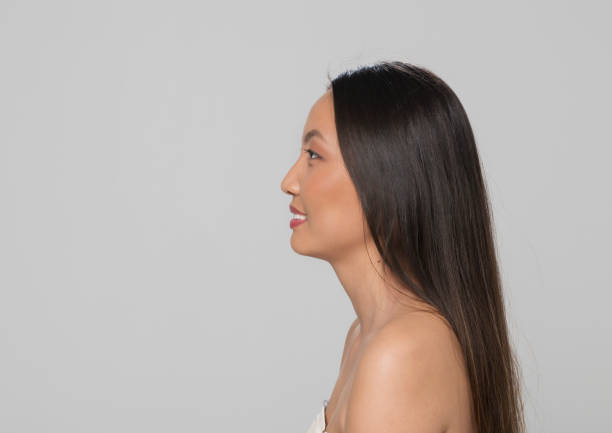 istock Profile of smiling young woman 1322274442