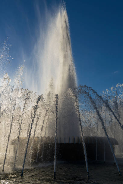 istock White fountain with a many jets in the evening sunlight 1322274550