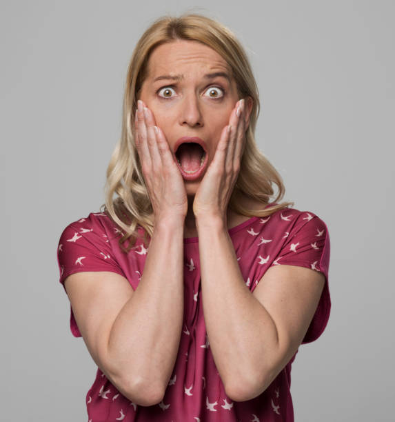 istock Close-up of scared woman 1322275240