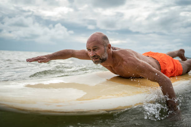 istock Senior man enjoying summer activities 1322275888