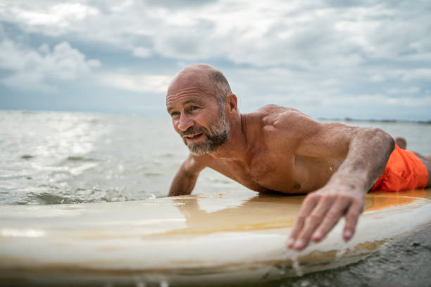 istock Senior man enjoying summer activities 1322275889