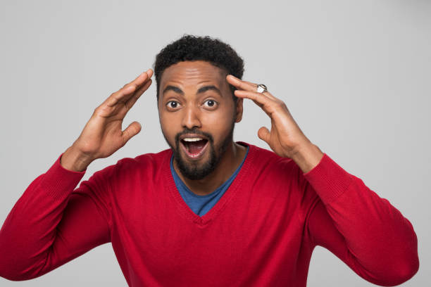 istock Close-up of surprised young man 1322277129