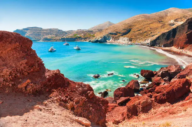 Red beach on Santorini island, Greece. Summer landscape, sea view. Famous travel destination