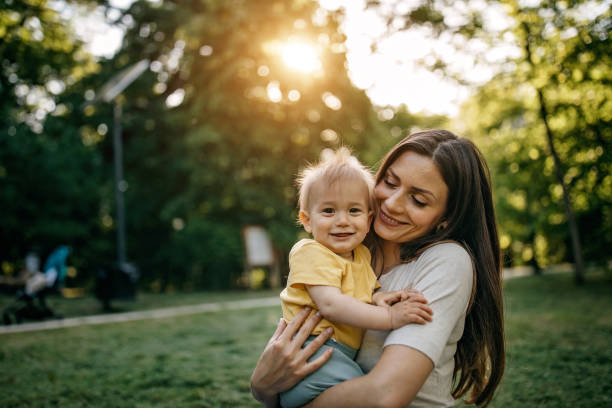 istock Mother playing with her baby 1322280352