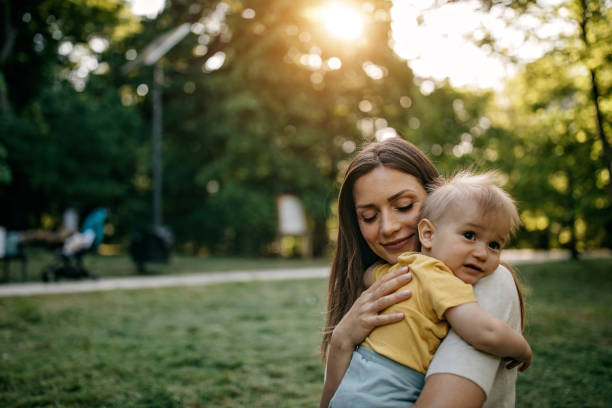 istock Mother playing with her baby 1322280378