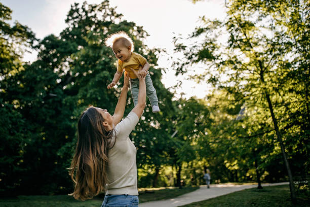 istock Mother playing with her baby 1322280413