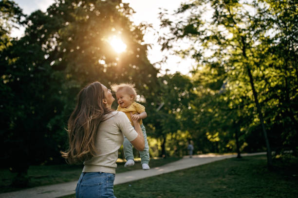 istock Mother playing with her baby 1322280419