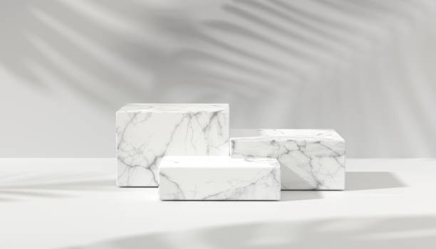istock Marbel podium  for product showcase. White marble product display. Natural light copy space. Minimal abstract cosmetic background for product presentation. 1322280718