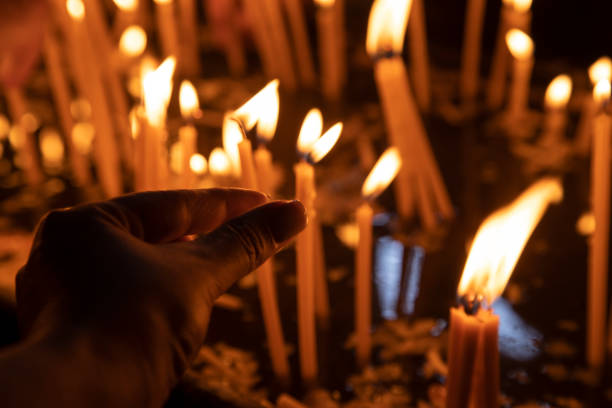 istock light candles in the church 1322282476