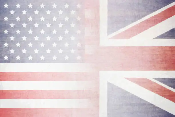 Vector illustration of A grunge effect horizontal vector illustration of faded USA(American)  and England  or the Great British flag Union Jack