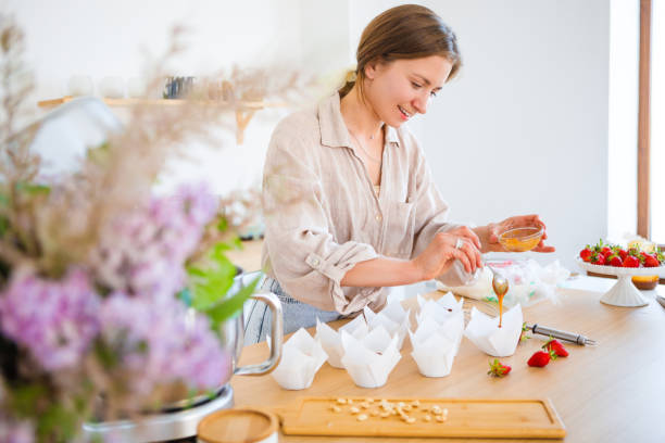 istock A pastry chef bakes a cake in the home kitchen. Home business. 1322286949