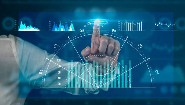 istock Hands of businessman analyzing sales data and economic growth graph chart on tablet and hologram screen. Business strategy and digital data, business technology, digital marketing. 1322288149