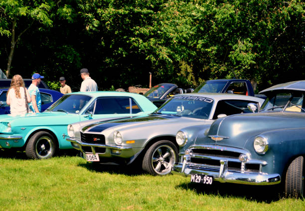 American vintage cars in a row. Iconic Classic American Cars. Collectors items at car show. The photo was taken mid day in Jægerspris June 5th, 2021, Denmark after a classic American car cruise. car classic light tail stock pictures, royalty-free photos & images