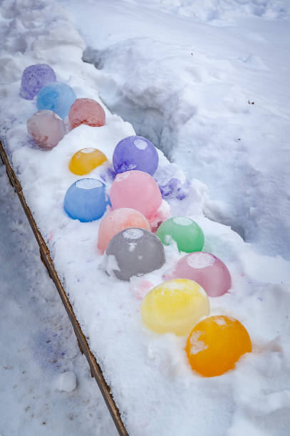 istock DIY ice lanterns stands on snow outside in winter. 1322289510