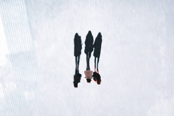 istock people shadows silhouette on the street 1322291161