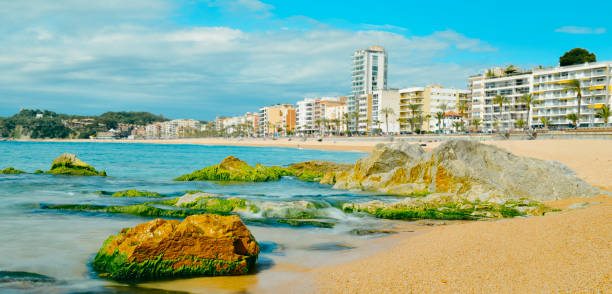 lloret beach in lloret de mar, spain, web banner - spain gerona architecture building exterior imagens e fotografias de stock