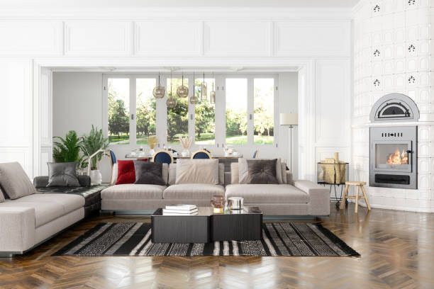 istock Modern Living Room Interior With Sofa, Dining Table, Fireplace And Garden View From The Window. 1322292674