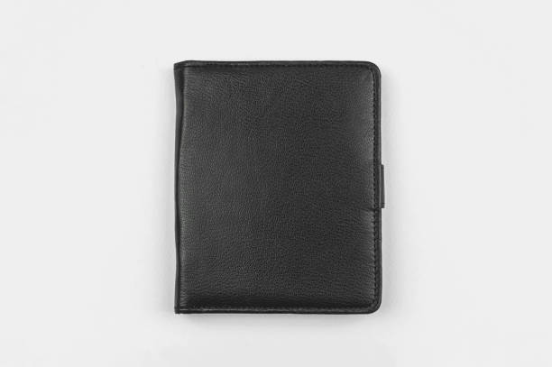 istock Black leather notepad on a grey office table mockup with place for your text 1322297111
