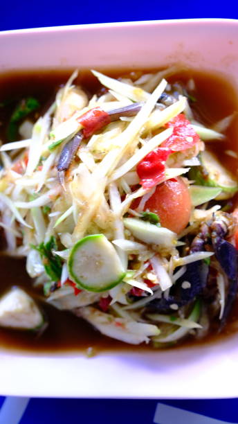 istock Green papaya salad (Som tum) with field crab, 1322298220