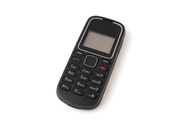 istock Old and outdated mobile phone isolated on white background. 1322301235