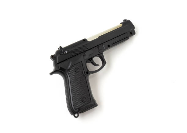 istock A pistol gun isolated on white background. 1322301241