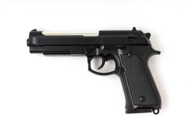 istock A pistol gun isolated on white background. 1322301294