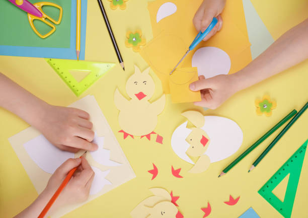istock Children's creativity. Craft paper, scissors, pencils, and other stationery 1322307049
