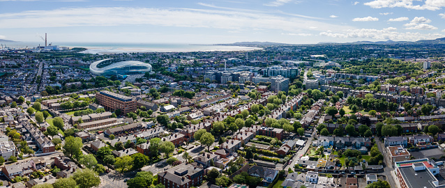 Drone aerial view of the Dublin skyline on a summer sunny day, Poolbeg chimneys in the far distance, shot from Ballsbridge area looking towards the south