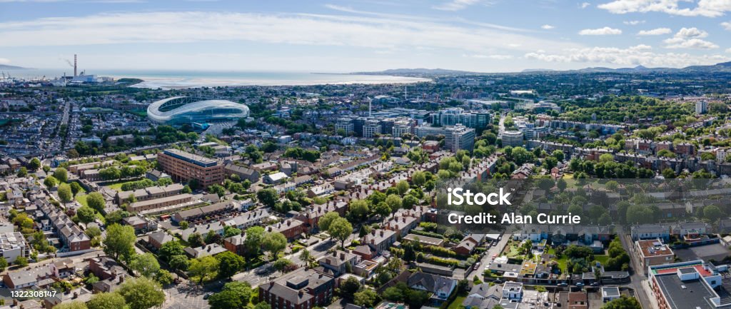 Panoramic aerial view of south Dublin city skyline on a sunny day Drone aerial view of the Dublin skyline on a summer sunny day, Poolbeg chimneys in the far distance, shot from Ballsbridge area looking towards the south Aviva Stadium Stock Photo