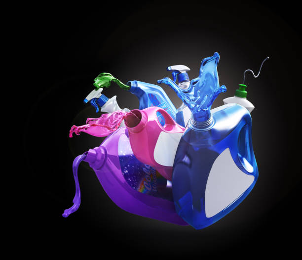 istock Different bottles with pouring detergent on a black background. 3d illustration 1322308155