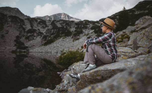 istock Sitting on rock in the mountains 1322309763