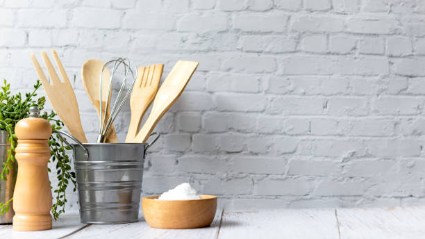 istock Kitchen tools and kitchenware utensil object on kitchen shelf wood white for healthy eat and health care life.  Wall white brick background, copy space for text 1322310180