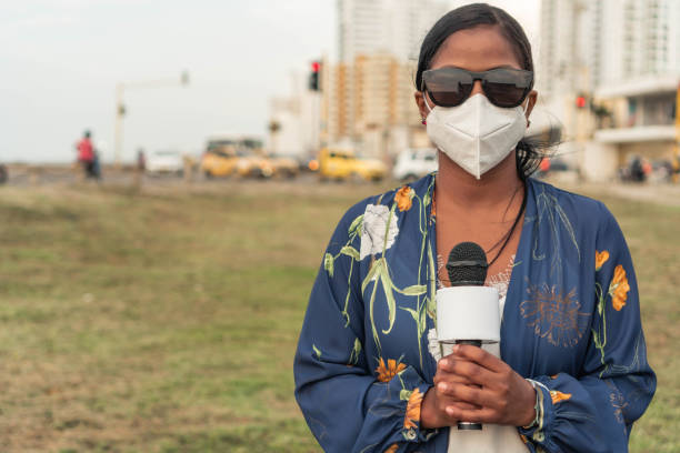 istock African American presenter in face mask 1322312169
