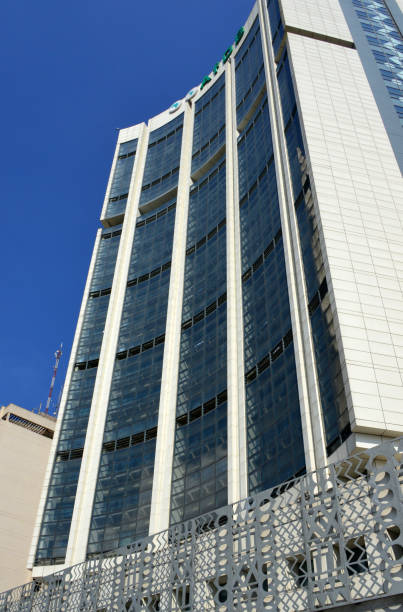 African Development Bank tower, Abidjan, Ivory Coast Abidjan, Ivory Coast / Côte d'Ivoire: looking up the tower of the African Development Bank / African Development Fund Avenue Lamblin, Plateau district - multilateral development finance institution headquartered in Abidjan, the AfDB is a financial provider to African governments and private companies investing in the member countries, comprises three entities: the African Development Bank, the African Development Fund and the Nigeria Trust Fund.(Banque Africaine de Developpement / Fonds Africain de Developpement). abidjan skyline stock pictures, royalty-free photos & images