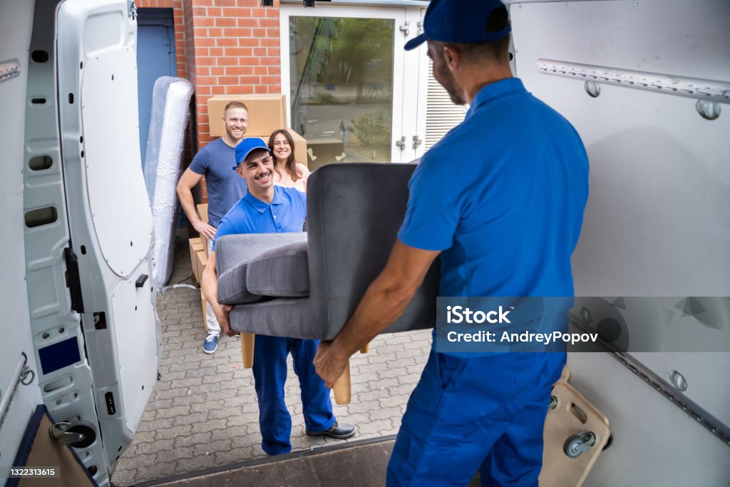 Happy Family Couple Watching Movers Unload Furniture Happy Family Couple Watching Movers Unload Furniture From Truck Mover Stock Photo Happy Family Couple Watching Movers Unload Furniture Happy Family Couple Watching Movers Unload Furniture From Truck Mover Stock Photo