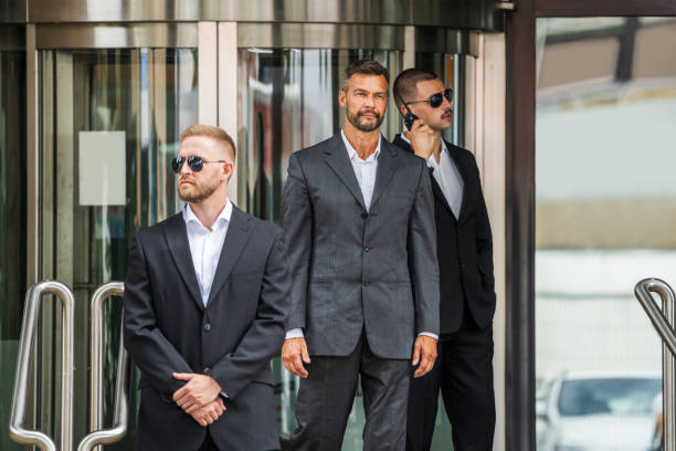 istock Security Guard Service Protecting Business Man 1322313688