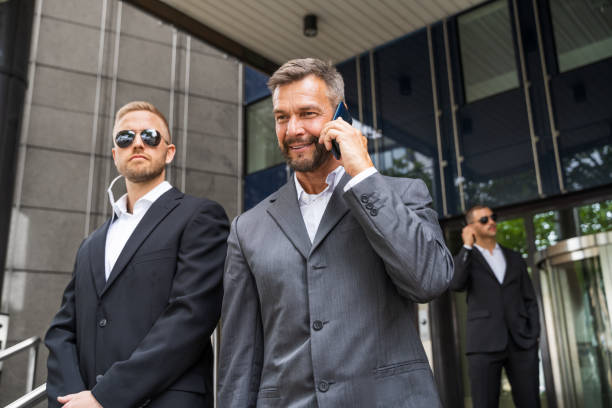 istock Security Guard Service Protecting Business Man 1322313690