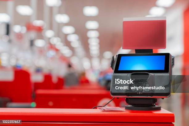 A Pos Machine At Woolworths Supermarkets Selfserve Checkout Area With Blur Bokeh Background Stock Photo - Download Image Now