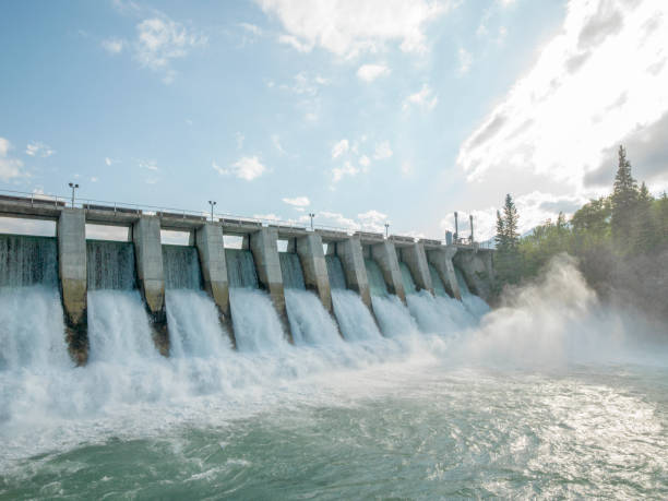 istock Water rushes through hydroelectric dam 1322319350