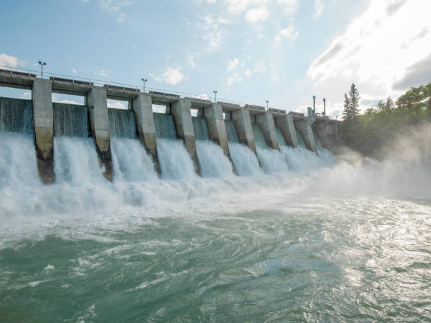 istock Water rushes through hydroelectric dam 1322319727