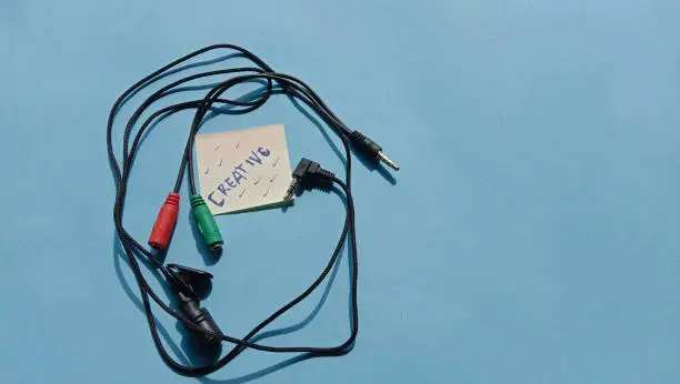 Photo of wired external microphone with cable that plugs into a smartphone or laptop